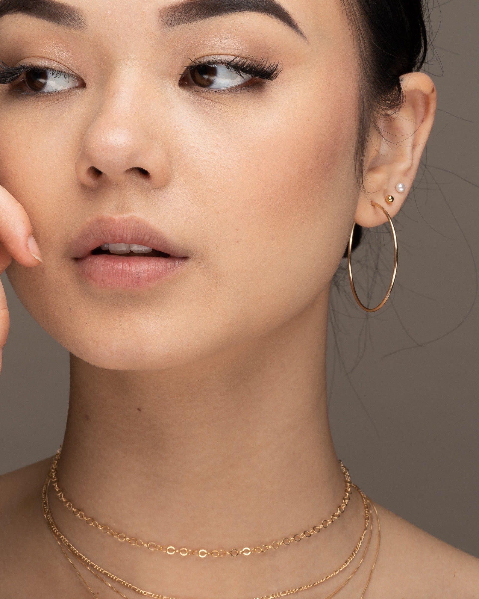 Gold infinity hoop earrings ERIJEWELRY